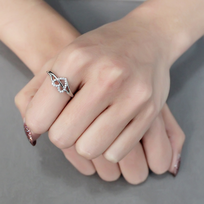 Highly polished (no plating) Heart Shaped Stainless Steel Ring with AAA grade Clear Zirconia Gems