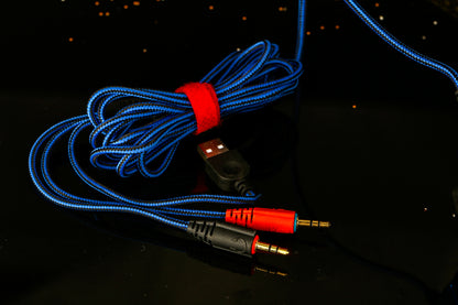 Wired over-ear gaming headphones feature RGB lighting, a built-in microphone, and a Type-C USB connection