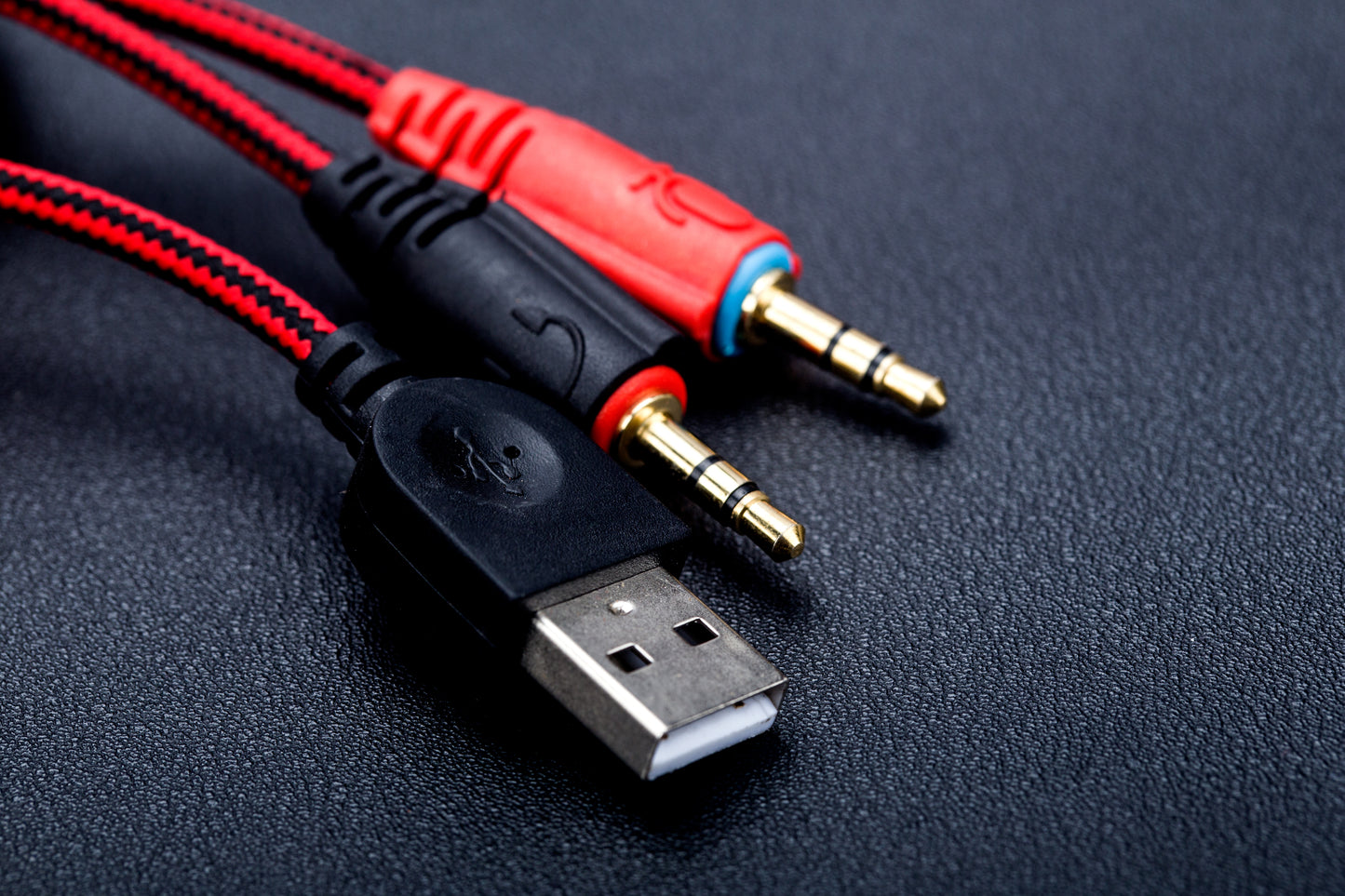 Wired over-ear gaming headphones feature RGB lighting, a built-in microphone, and a Type-C USB connection